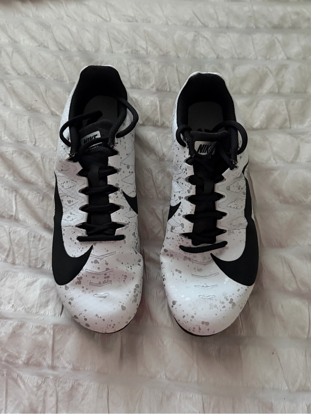 Nike White and Black Speckled Running Cleats